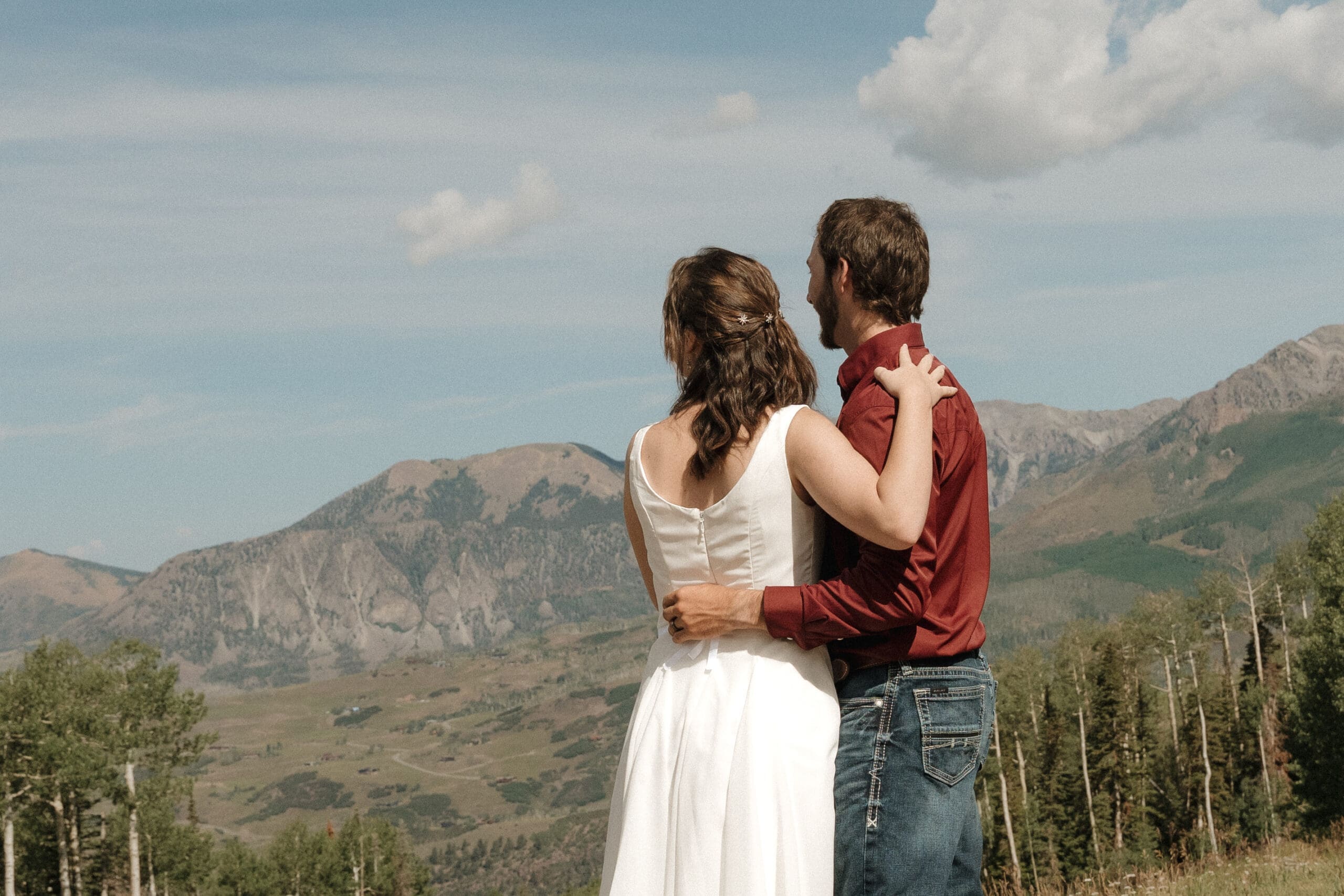 Couple exchanging private vows during a Colorado mountain elopement