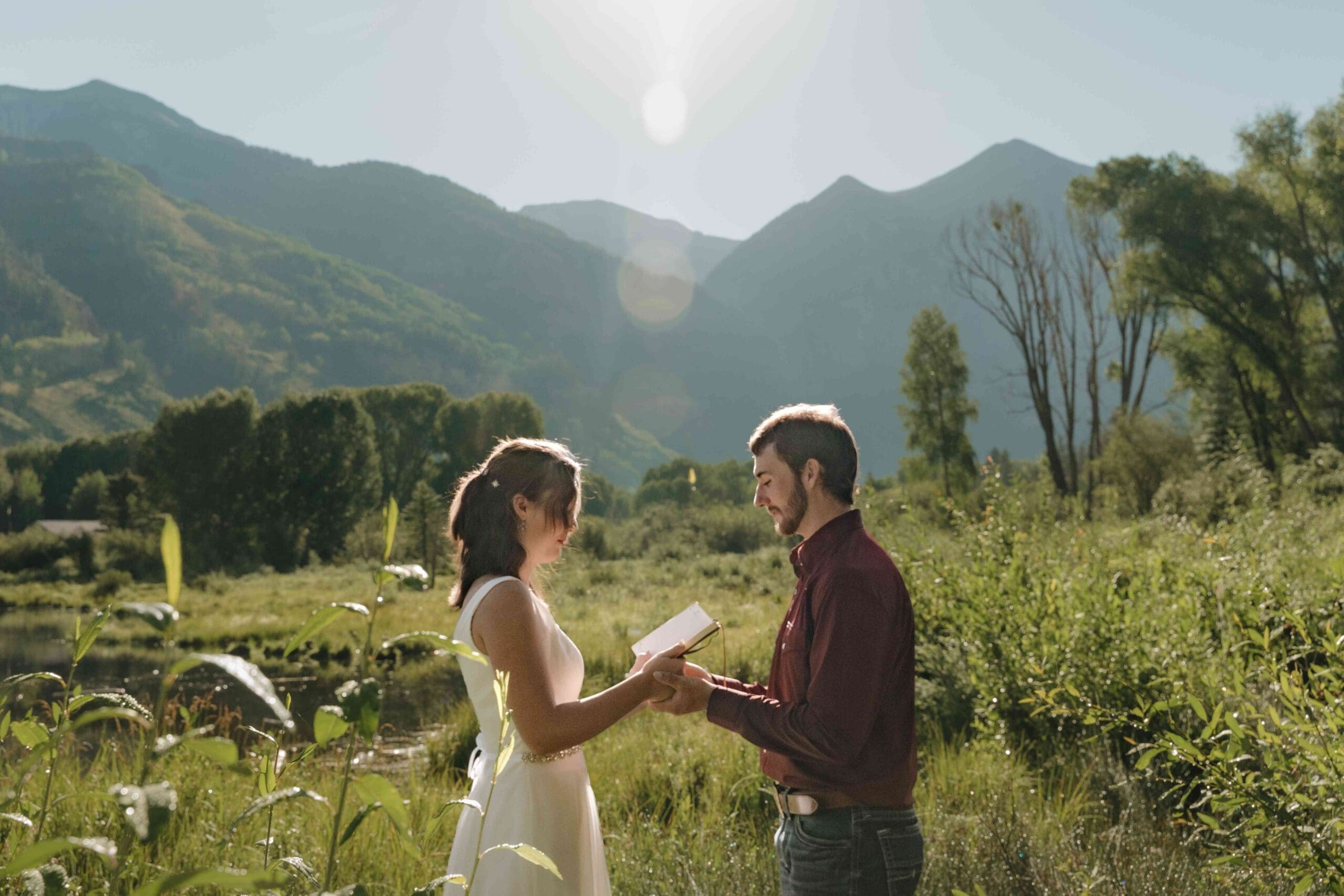 Two people self solemnizing during an intimate elopement in Telluride, Colorado